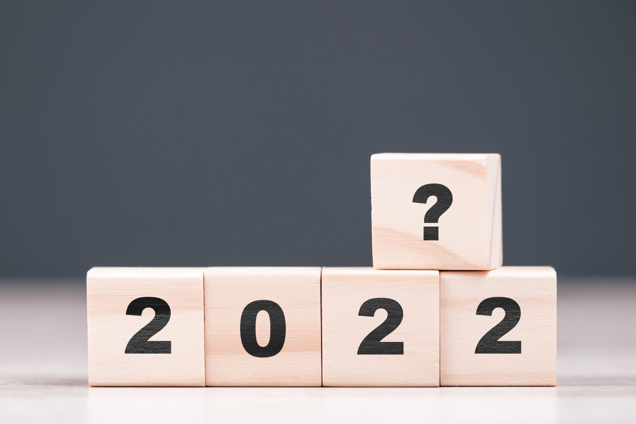 The,2022,Year,Numbers,With,A,Question,Mark,On,Wood